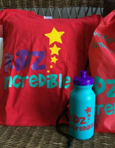Creative Kids Fort Mill | t-shirt with drink bottle and a backpack with information packet